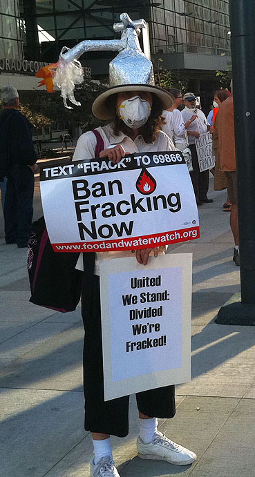 protester at EPA rally with frack hat.